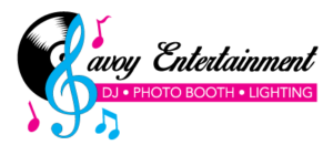 A pink and blue photo booth sign with music notes.