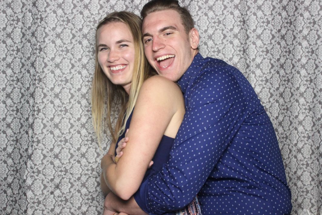 A man and woman posing for the camera.